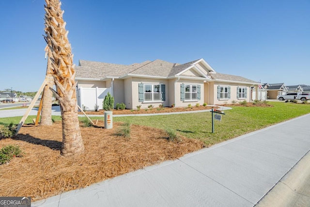 114 Richard Lee Dr, Kingsland, GA 31548 - ranch-style home with stucco siding
