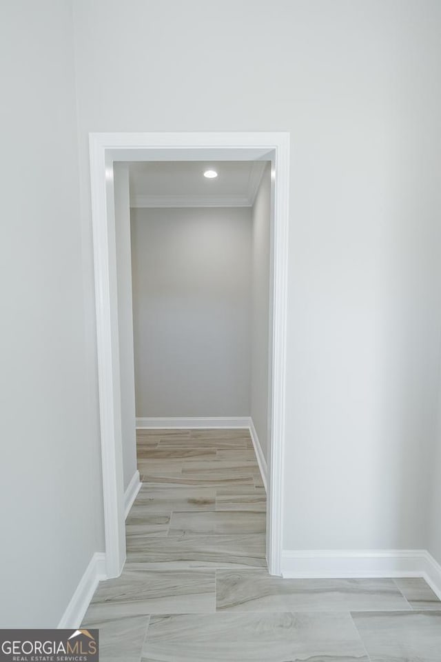 114 Richard Lee Dr, Kingsland, GA 31548 - corridor with crown molding and baseboards