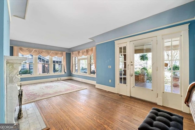 2265 E Lake Rd NE, Atlanta, GA 30307 - foyer featuring hardwood / wood-style floors, baseboards, and visible vents