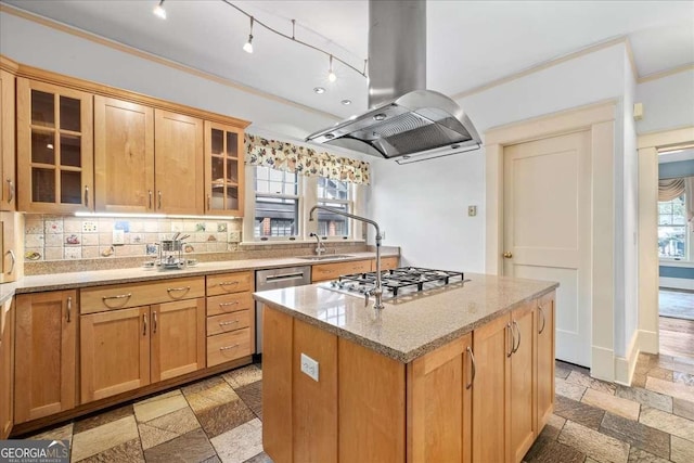 2265 E Lake Rd NE, Atlanta, GA 30307 - kitchen with island exhaust hood, stainless steel appliances, tasteful backsplash, a center island, and stone tile floors