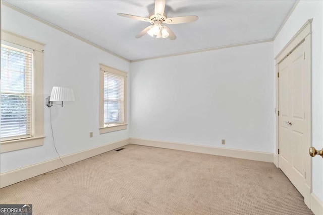 2265 E Lake Rd NE, Atlanta, GA 30307 - interior space featuring plenty of natural light, crown molding, and light colored carpet