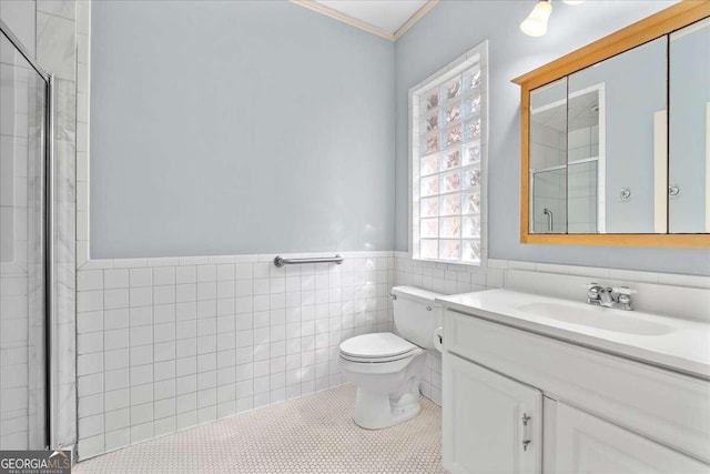 2265 E Lake Rd NE, Atlanta, GA 30307 - full bathroom with a shower with door, toilet, vanity, and tile walls
