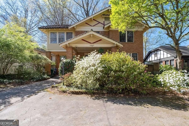 2265 E Lake Rd NE, Atlanta, GA 30307 - view of front facade with driveway and brick siding