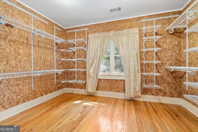 2265 E Lake Rd NE, Atlanta, GA 30307 - walk in closet featuring visible vents and wood finished floors