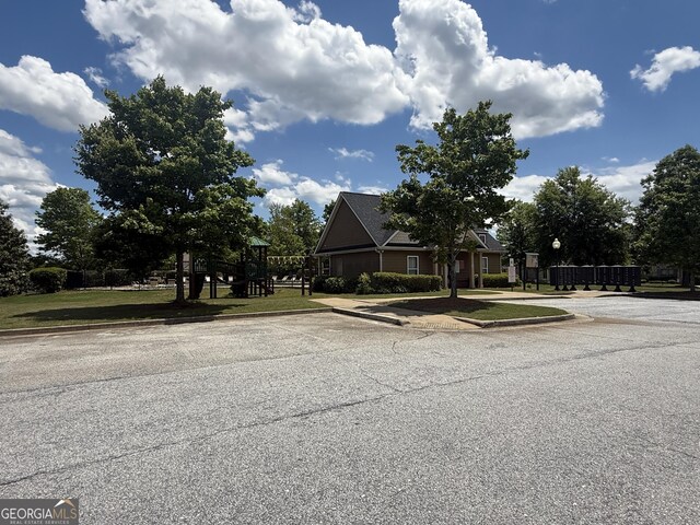 view of front of property featuring uncovered parking