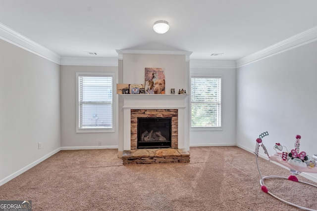 1606 Kenilworth Ln SE, Conyers, GA 30013 - carpeted living area featuring a fireplace, crown molding, plenty of natural light, and baseboards