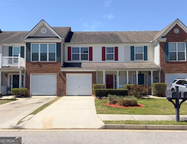 7229 Georges Way, Morrow, GA 30260 - multi unit property with driveway, brick siding, a garage, and a front lawn
