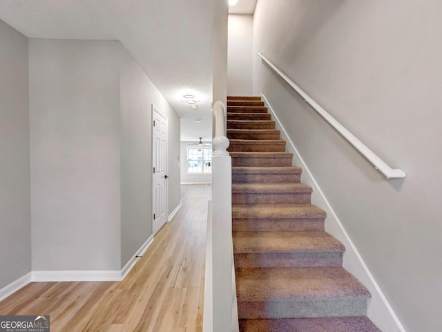 7229 Georges Way, Morrow, GA 30260 - staircase featuring baseboards and wood finished floors