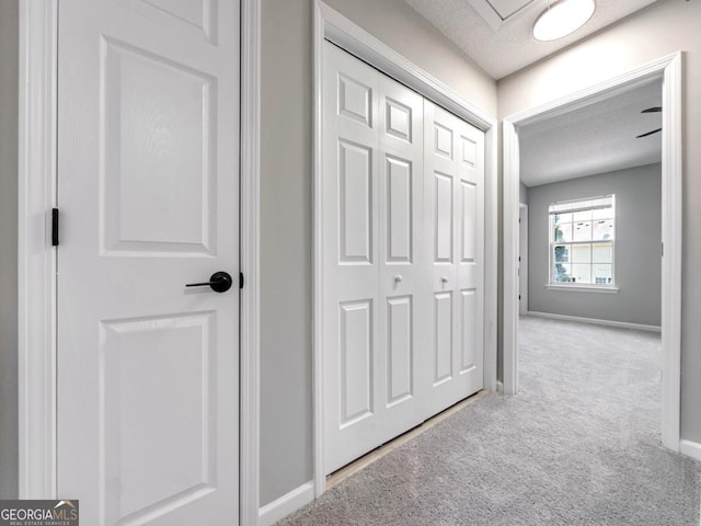 7229 Georges Way, Morrow, GA 30260 - hallway with baseboards, carpet floors, and a textured ceiling