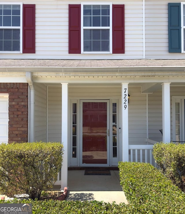 7229 Georges Way, Morrow, GA 30260 - entrance to property with covered porch and brick siding