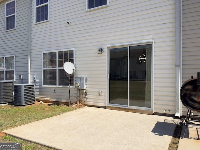 7229 Georges Way, Morrow, GA 30260 - exterior space with central AC and a patio area