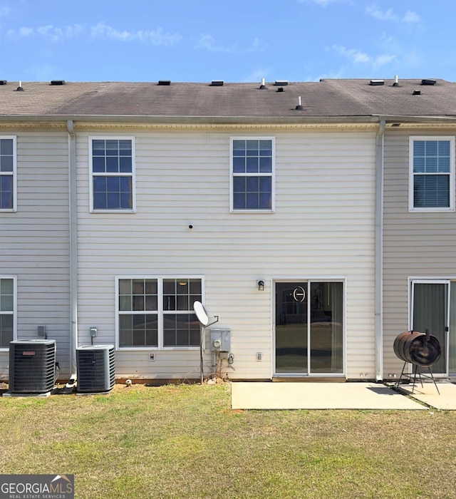 7229 Georges Way, Morrow, GA 30260 - rear view of house with a patio, cooling unit, and a yard