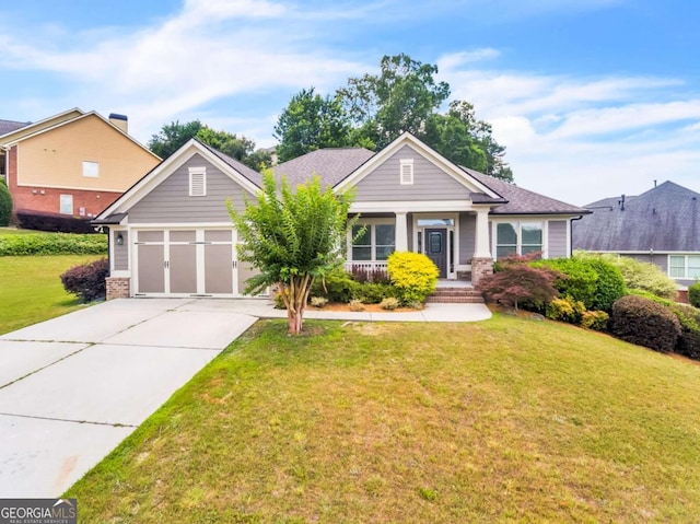 7503 Brookstone Cir, Flowery Branch, GA 30542 - view of front of home featuring an attached garage, concrete driveway, brick siding, and a front yard