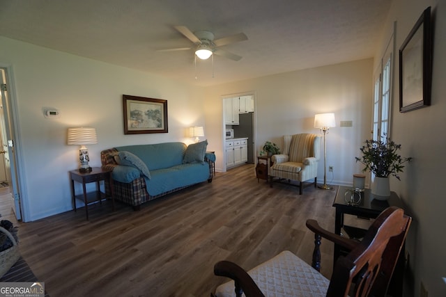 1848 Tenny Nelson Rd, Grantville, GA 30220 - living room featuring a ceiling fan, dark wood-style flooring, and baseboards