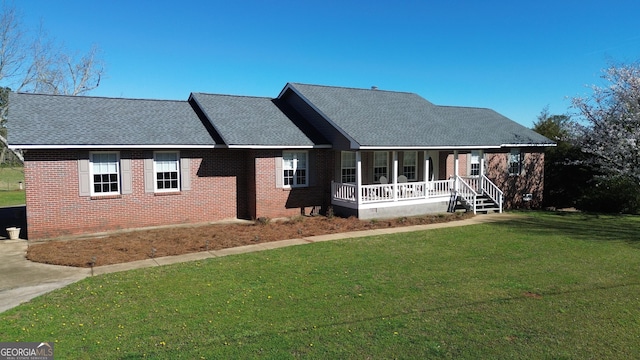 1848 Tenny Nelson Rd, Grantville, GA 30220 - single story home with covered porch, brick siding, a shingled roof, and a front lawn