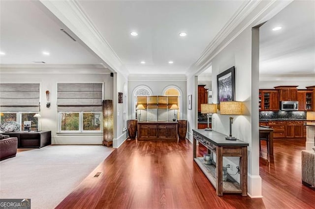 1109 Pine Grove Ave, Brookhaven, GA 30319 - hall with ornamental molding, dark wood-style flooring, and recessed lighting