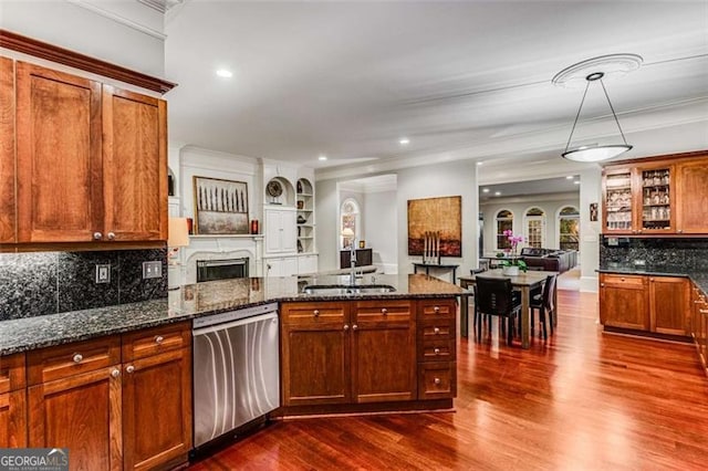1109 Pine Grove Ave, Brookhaven, GA 30319 - kitchen featuring stainless steel dishwasher, a peninsula, dark wood finished floors, open floor plan, and ornamental molding