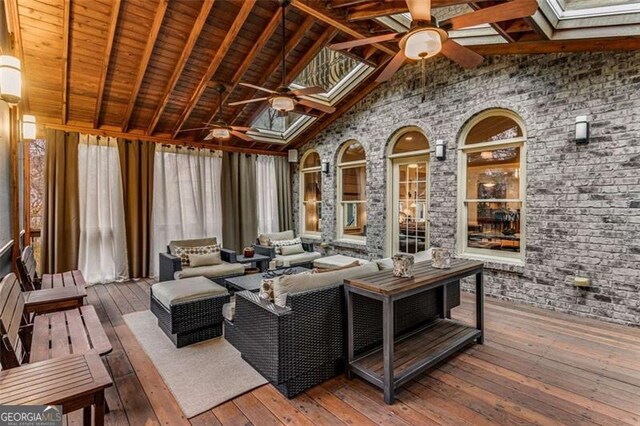 1109 Pine Grove Ave, Brookhaven, GA 30319 - sunroom with a wooden deck, wood-type flooring, high vaulted ceiling, and a wood ceiling with exposed beams