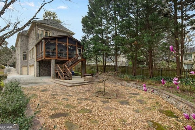 1109 Pine Grove Ave, Brookhaven, GA 30319 - view of yard featuring a sunroom and stairs