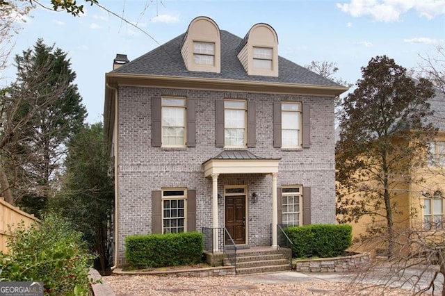 1109 Pine Grove Ave, Brookhaven, GA 30319 - view of front of house featuring brick siding and a chimney