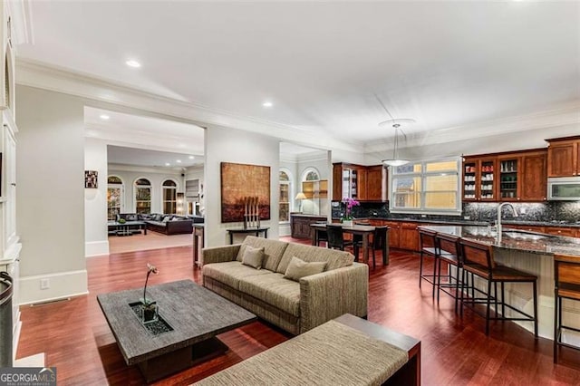 1109 Pine Grove Ave, Brookhaven, GA 30319 - living area with ornamental molding, recessed lighting, and dark wood-type flooring