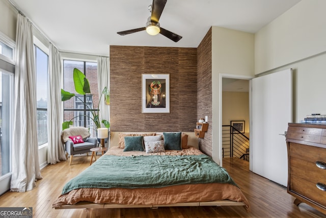 307 Cherokee Ave SE Unit 3, Atlanta, GA 30312 - bedroom featuring multiple windows, wood finished floors, and a ceiling fan