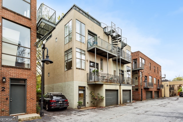 307 Cherokee Ave SE Unit 3, Atlanta, GA 30312 - view of apartment building / complex featuring an attached garage