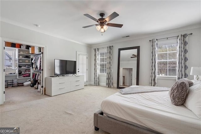 557 Stone Field Run NW, Marietta, GA 30060 - bedroom featuring light colored carpet, visible vents, ceiling fan, and a spacious closet