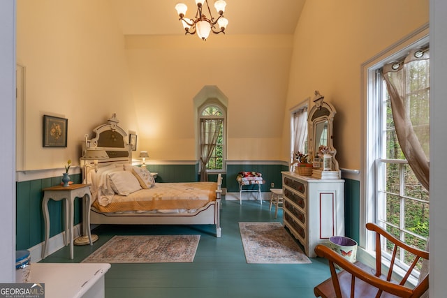 2977 Glover Dr, Cumming, GA 30040 - bedroom featuring a wainscoted wall, a chandelier, and wood finished floors