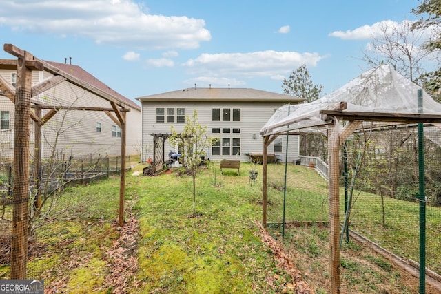 5225 Tye Trl, Fairburn, GA 30213 - rear view of property featuring a pergola