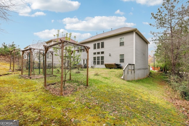 5225 Tye Trl, Fairburn, GA 30213 - rear view of property featuring a yard