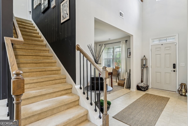 5225 Tye Trl, Fairburn, GA 30213 - foyer entrance with stairway and a towering ceiling