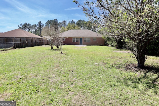 view of yard featuring fence