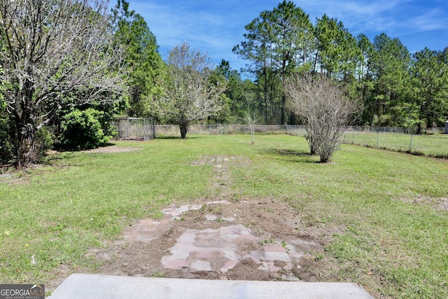 view of yard featuring fence