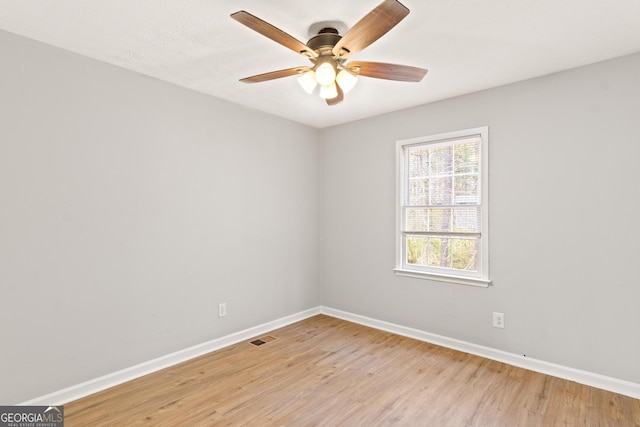 140 Elberta Dr, Newnan, GA 30265 - unfurnished room featuring baseboards, light wood finished floors, and ceiling fan