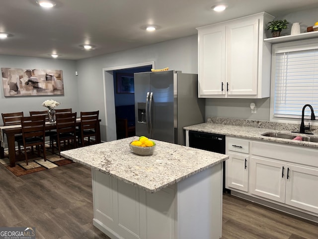 1815 Old Salem Rd SE, Conyers, GA 30013 - kitchen featuring a sink, stainless steel fridge with ice dispenser, black dishwasher, white cabinets, and dark wood-type flooring