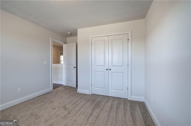 106 Lighthouse Cv SW, Adairsville, GA 30103 - unfurnished bedroom with carpet and a closet