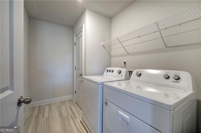 106 Lighthouse Cv SW, Adairsville, GA 30103 - washroom featuring washer and clothes dryer and baseboards