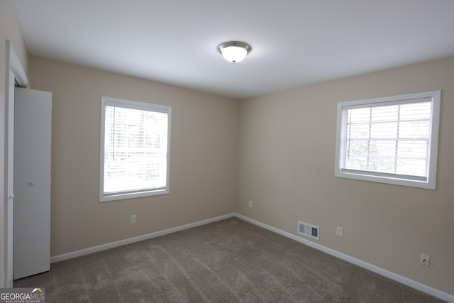 4183 Northstrand Dr, Decatur, GA 30035 - carpeted empty room featuring baseboards and visible vents