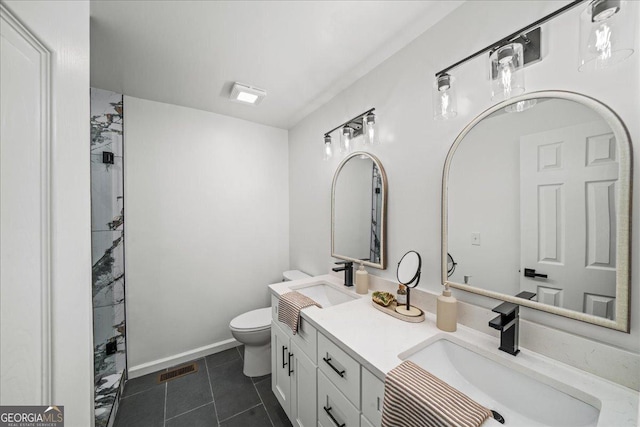 3951 Covered Bridge Rd SW, Smyrna, GA 30082 - full bath with double vanity, toilet, tile patterned flooring, and a shower