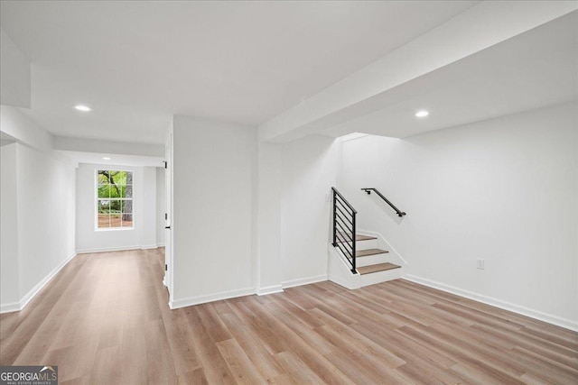 3951 Covered Bridge Rd SW, Smyrna, GA 30082 - unfurnished room with light wood-type flooring, stairs, recessed lighting, and baseboards