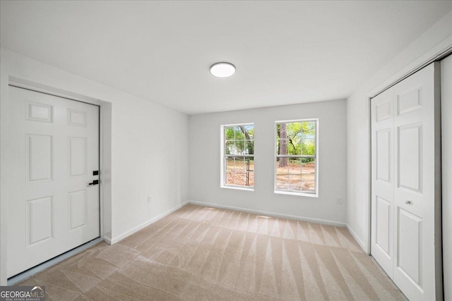3951 Covered Bridge Rd SW, Smyrna, GA 30082 - unfurnished bedroom with carpet, baseboards, and a closet