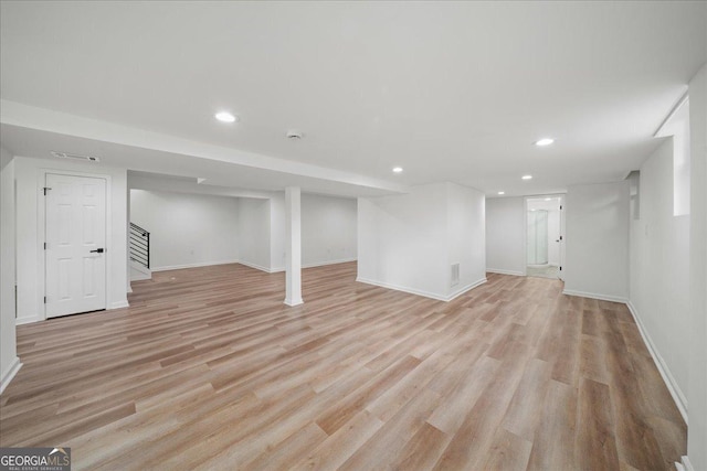 3951 Covered Bridge Rd SW, Smyrna, GA 30082 - finished basement with recessed lighting, stairway, baseboards, and light wood finished floors