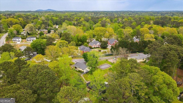 3951 Covered Bridge Rd SW, Smyrna, GA 30082 - aerial view of property and surrounding area with a forest and nearby suburban area