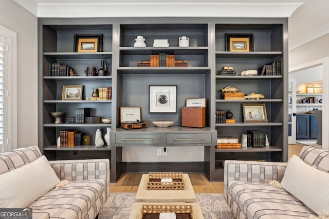 2587 Apple Valley Rd, Brookhaven, GA 30319 - sitting room with light wood-style flooring and built in features