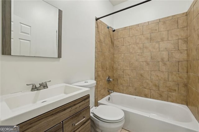 full bathroom featuring bathing tub / shower combination, vanity, and toilet