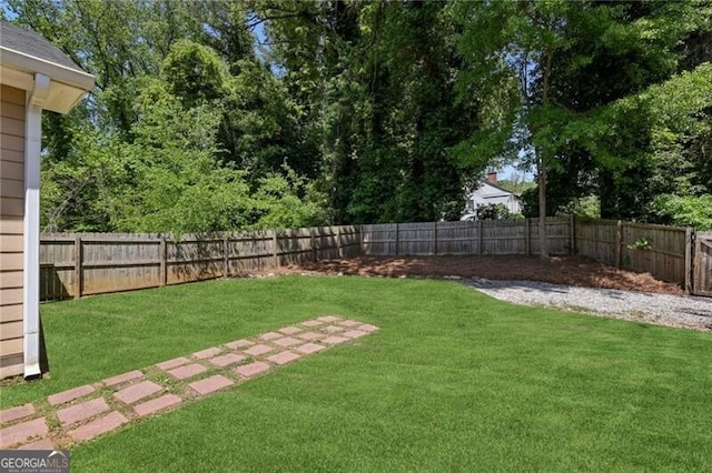 view of yard featuring a fenced backyard