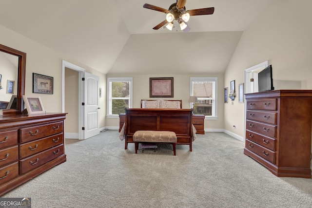carpeted bedroom featuring baseboards, ceiling fan, and vaulted ceiling