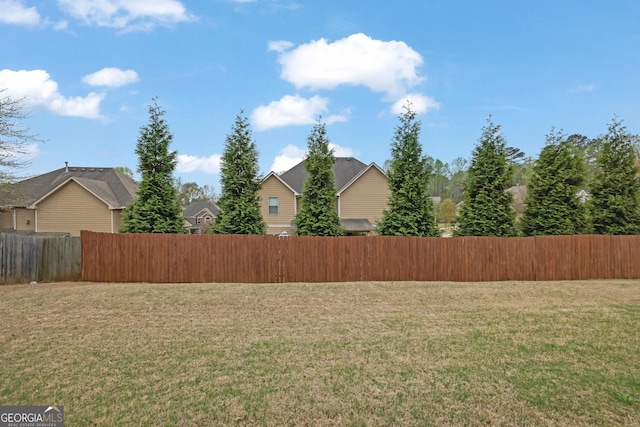 view of yard featuring fence
