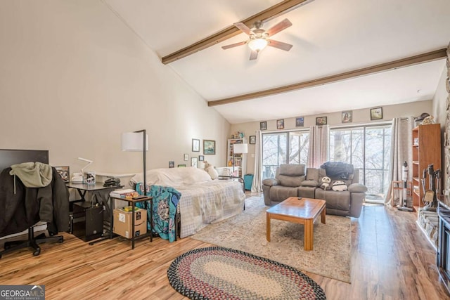 200 Villa Rd Unit 103, Jasper, GA 30143 - living room with wood finished floors, beamed ceiling, a ceiling fan, and high vaulted ceiling